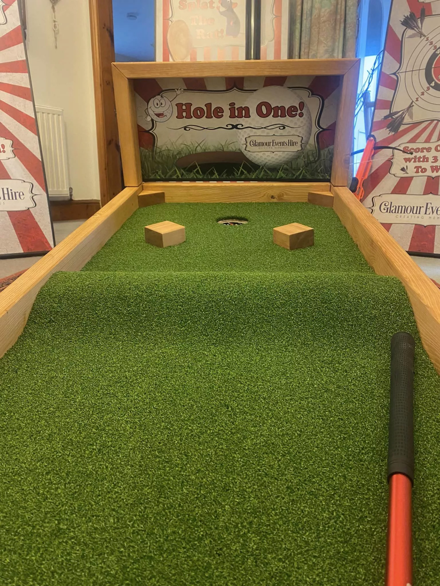 Thumbnail 1 — WD15 Hole in One -  the ball comes back. . The games is 6ft long and 2ft wide and comes with adjustable putter and ball. for Sale