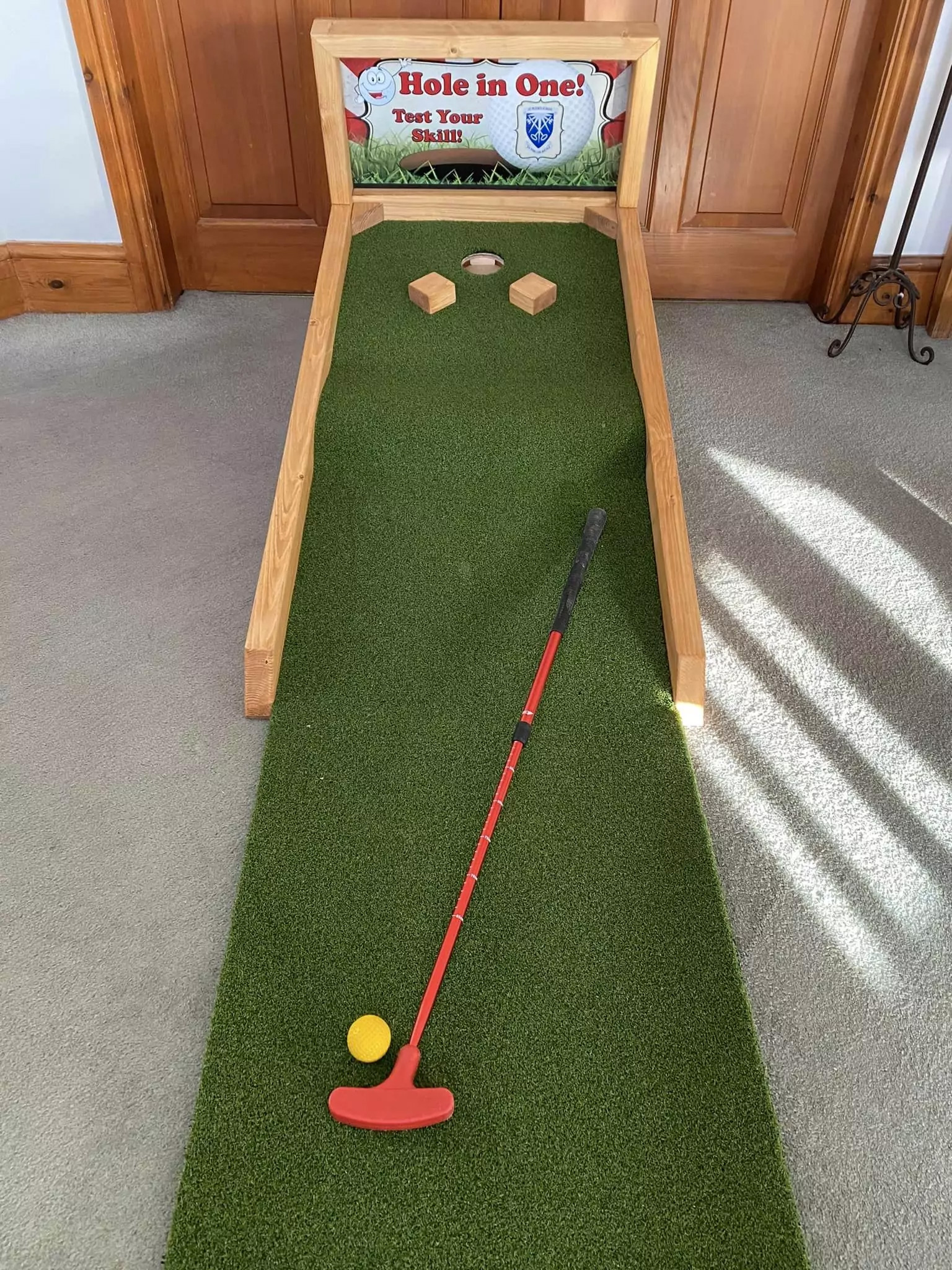 Thumbnail 3 — WD15 Hole in One -  the ball comes back. . The games is 6ft long and 2ft wide and comes with adjustable putter and ball. for Sale